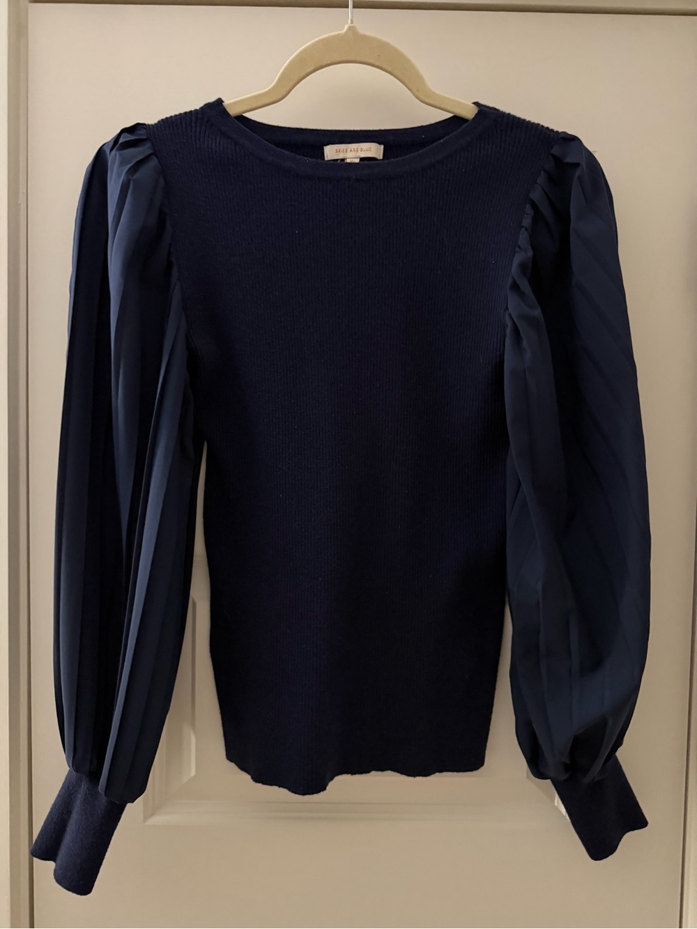 Navy Knit Top with Pleated Balloon Sleeve.